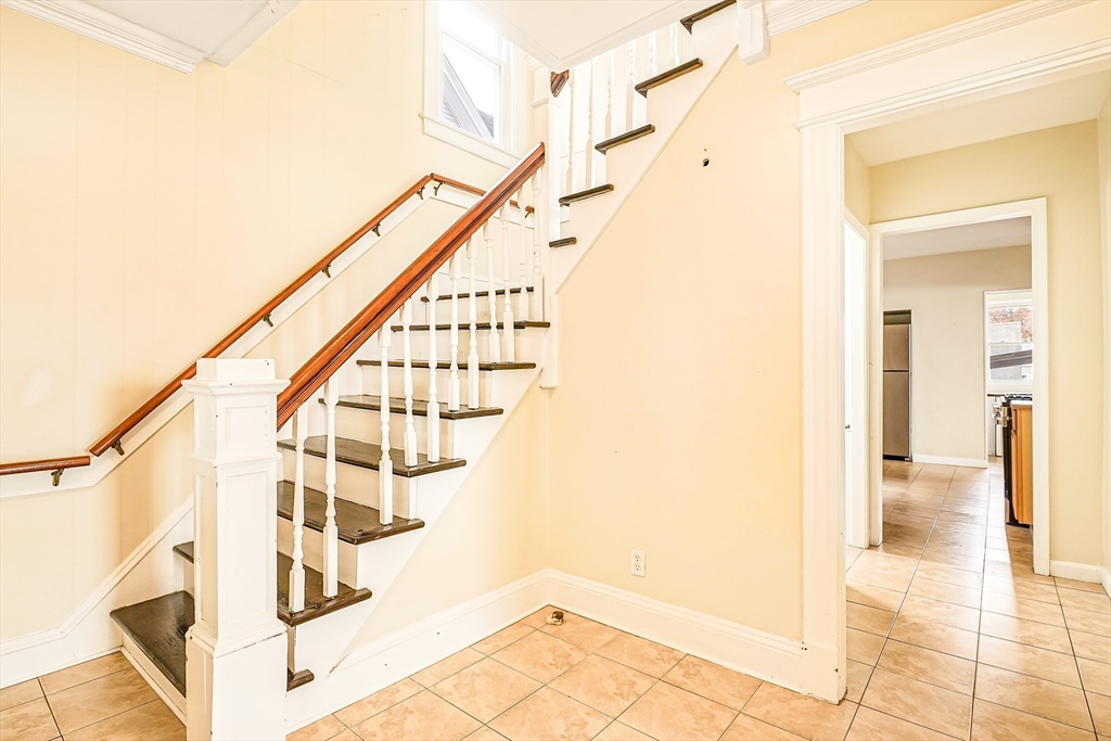 18 Sycamore Street Springfield, MA 01109 - Photo 4 of 22 a view of entryway and hall with wooden floor