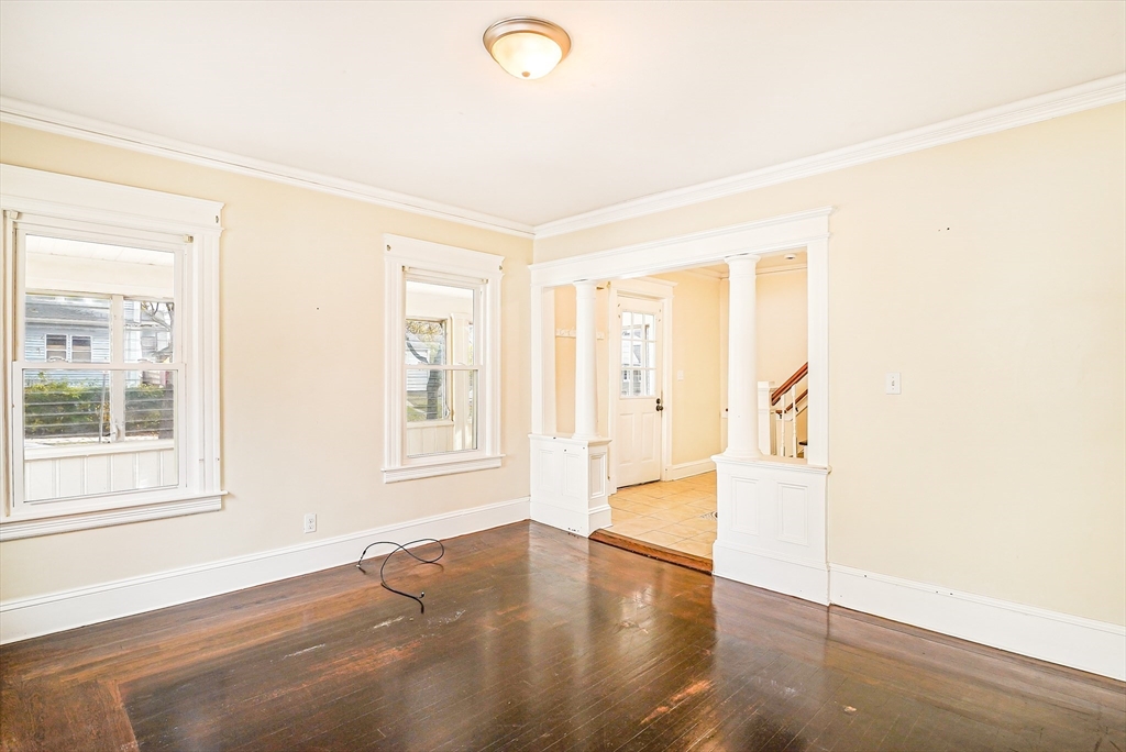 18 Sycamore Street Springfield, MA 01109 - Photo 5 of 22 a view of an empty room with a window