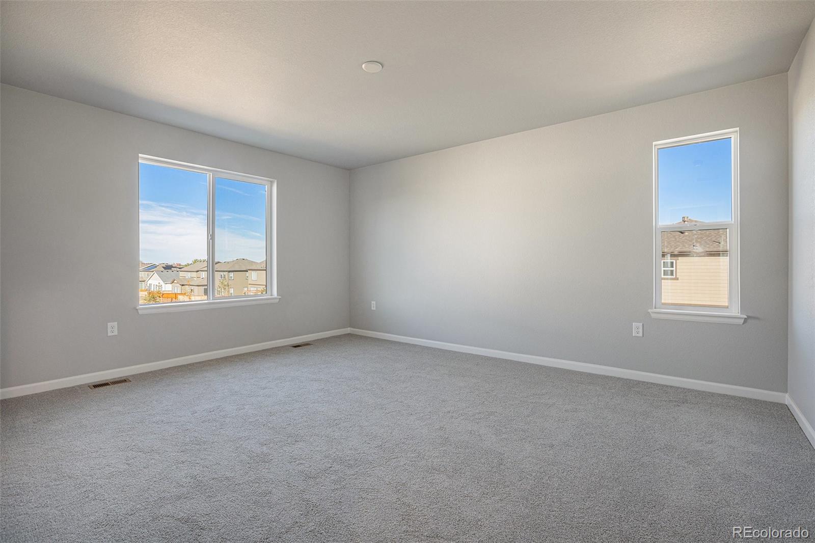15965 Stringhalt Way Parker, CO 80134 - Photo 21 of 33 a view of an empty room with a window