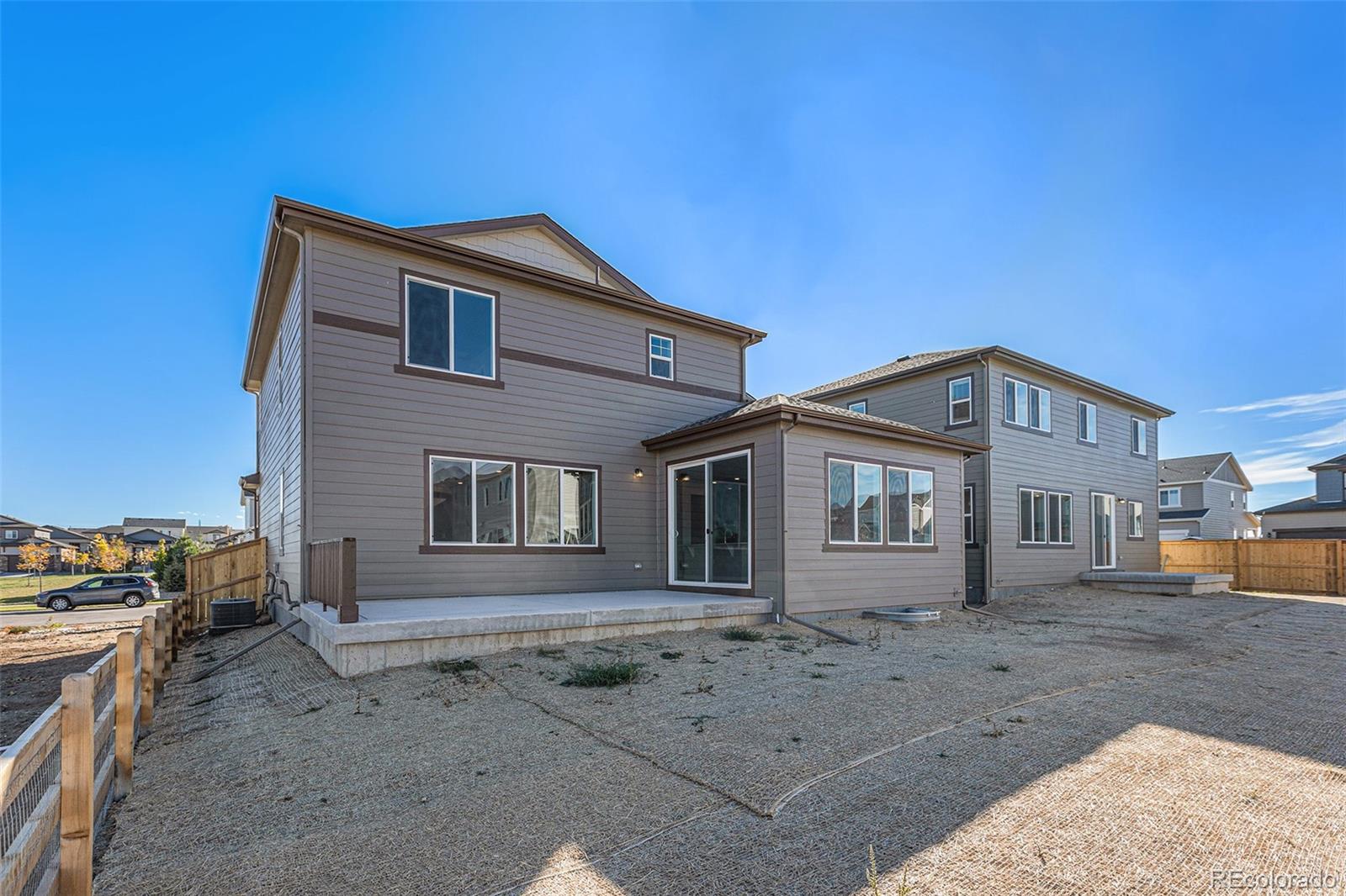 15965 Stringhalt Way Parker, CO 80134 - Photo 27 of 33 a front view of a house with a yard