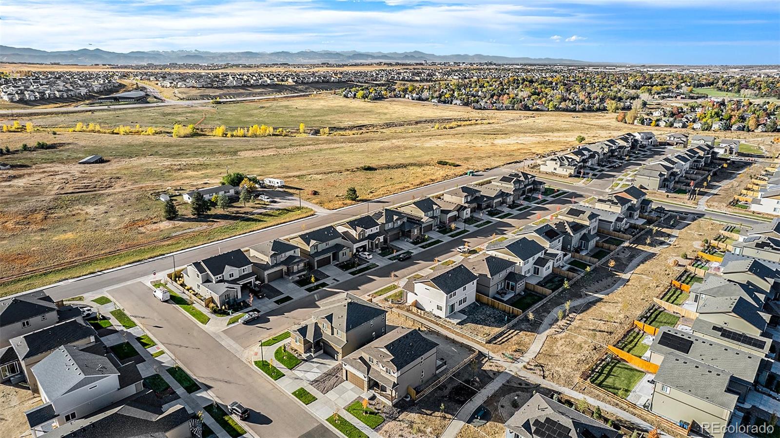 15965 Stringhalt Way Parker, CO 80134 - Photo 3 of 33 a view of a city with ocean view