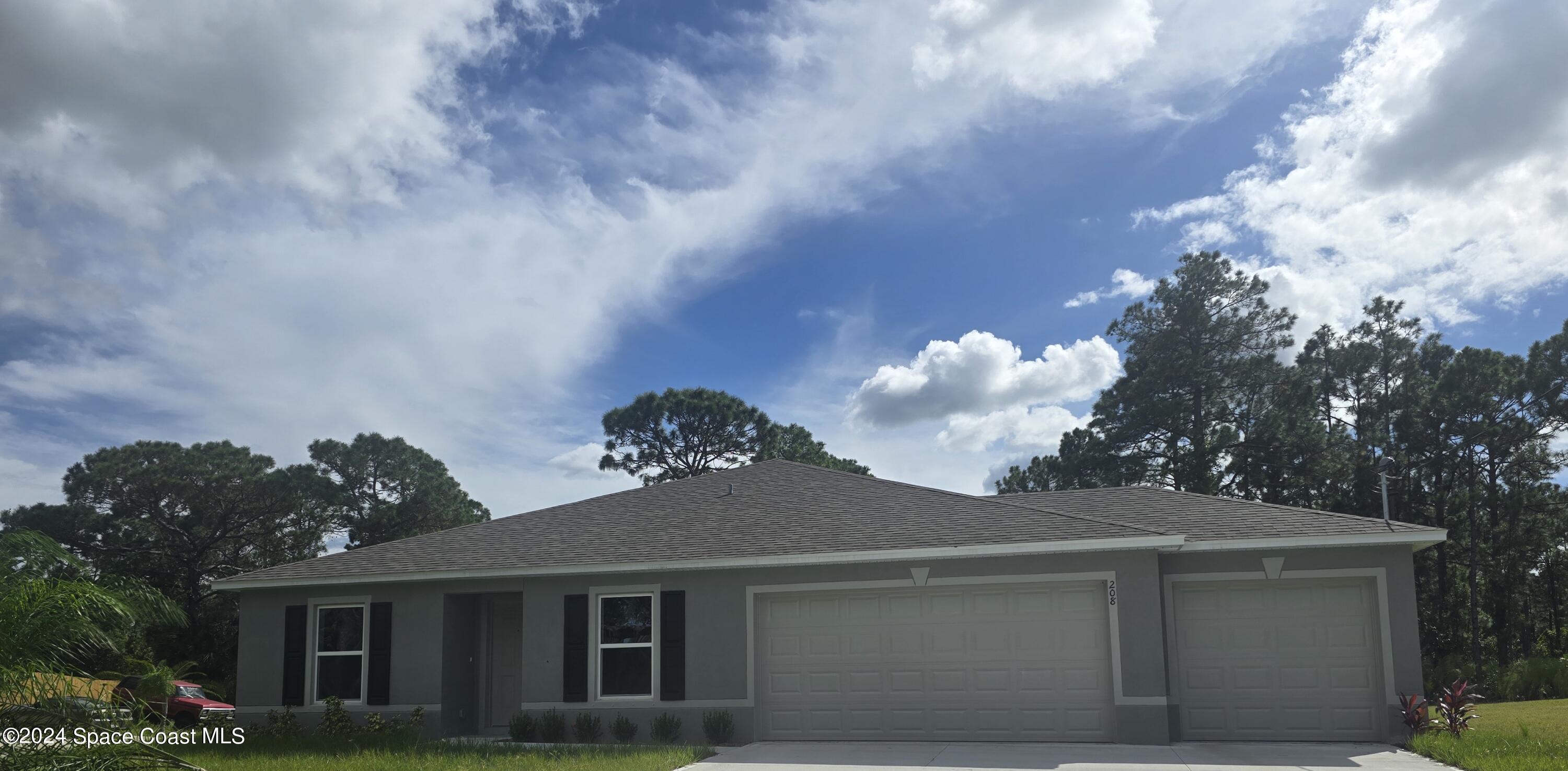 208 Tucson Road Southwest Palm Bay, FL 32908 - Photo 1 of 3 208 tuscun