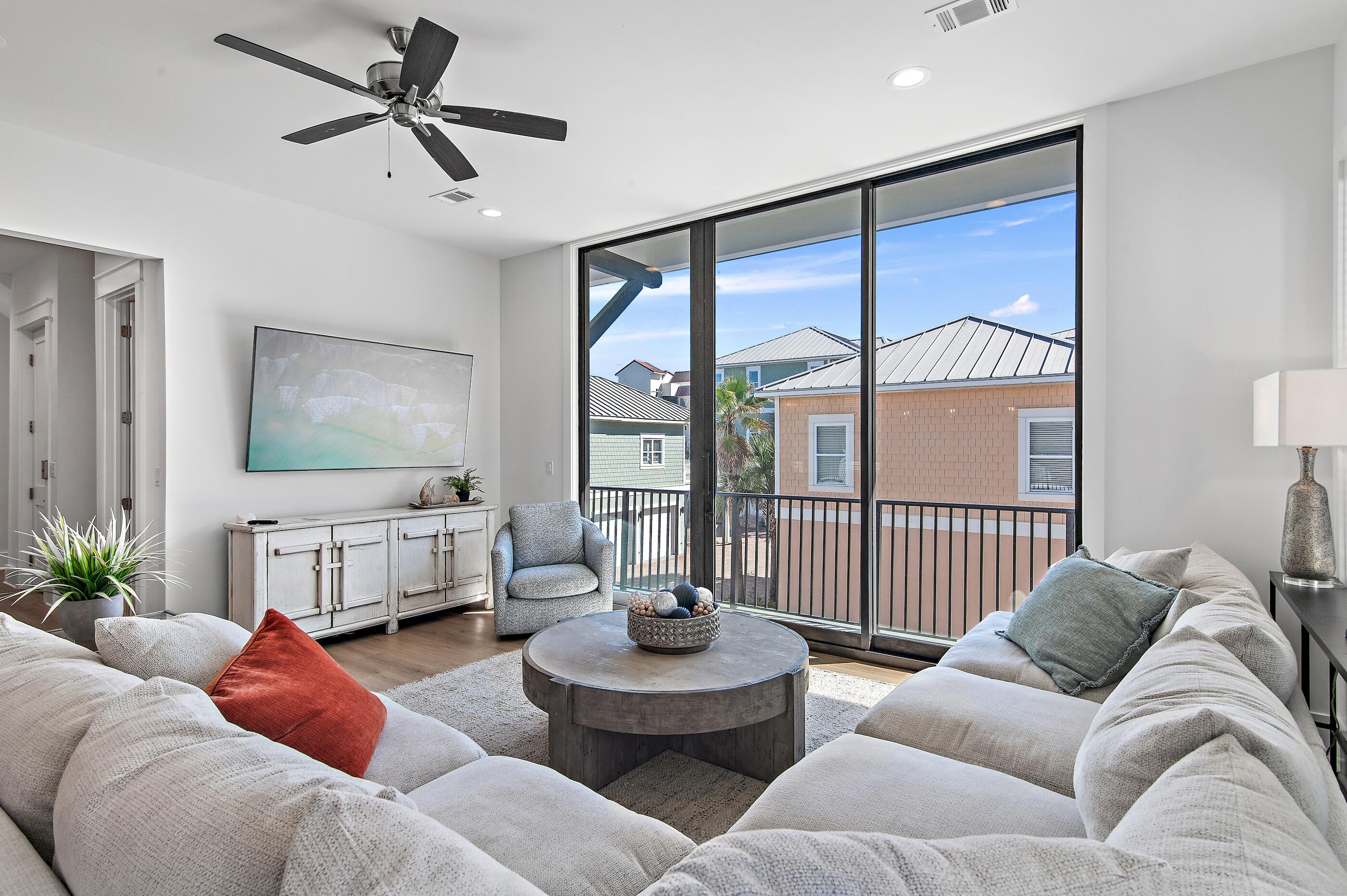 217 Snowdrift Road Miramar Beach, FL 32550 - Photo 11 of 66 a living room with furniture and a large window