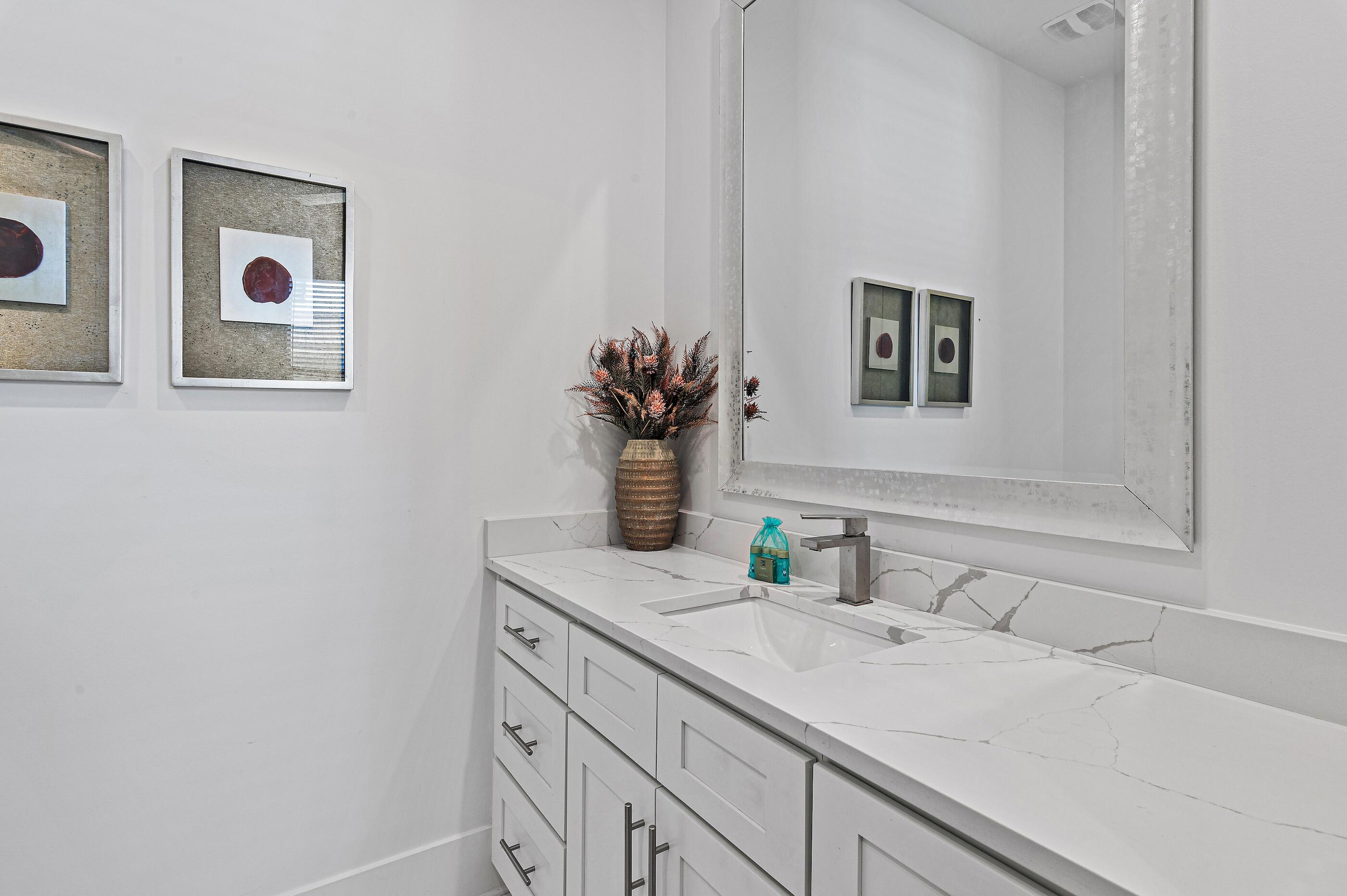 217 Snowdrift Road Miramar Beach, FL 32550 - Photo 36 of 66 a bathroom with a sink and a mirror