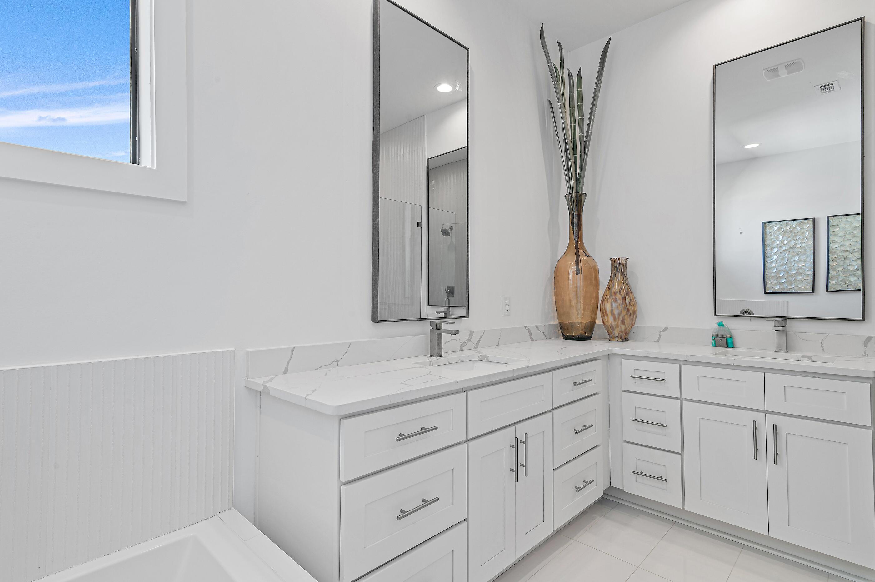 217 Snowdrift Road Miramar Beach, FL 32550 - Photo 49 of 66 a bathroom with a sink and a mirror