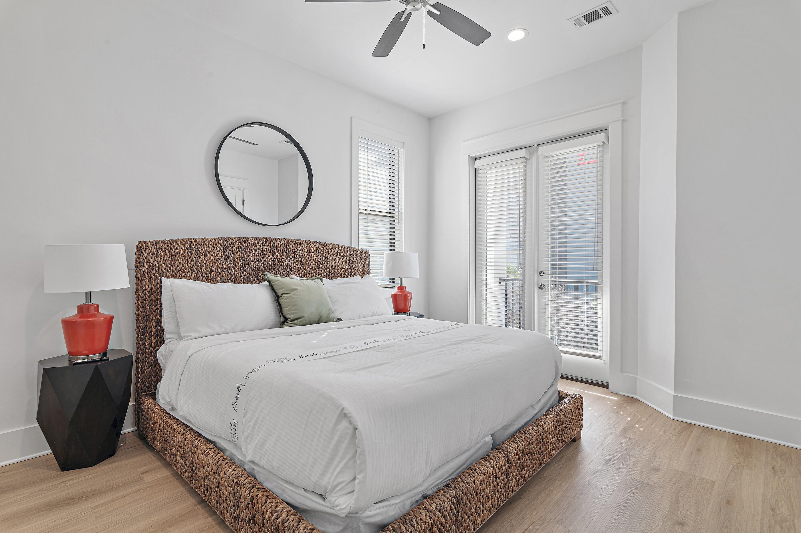 217 Snowdrift Road Miramar Beach, FL 32550 - Photo 51 of 66 a bedroom with a large bed and a window