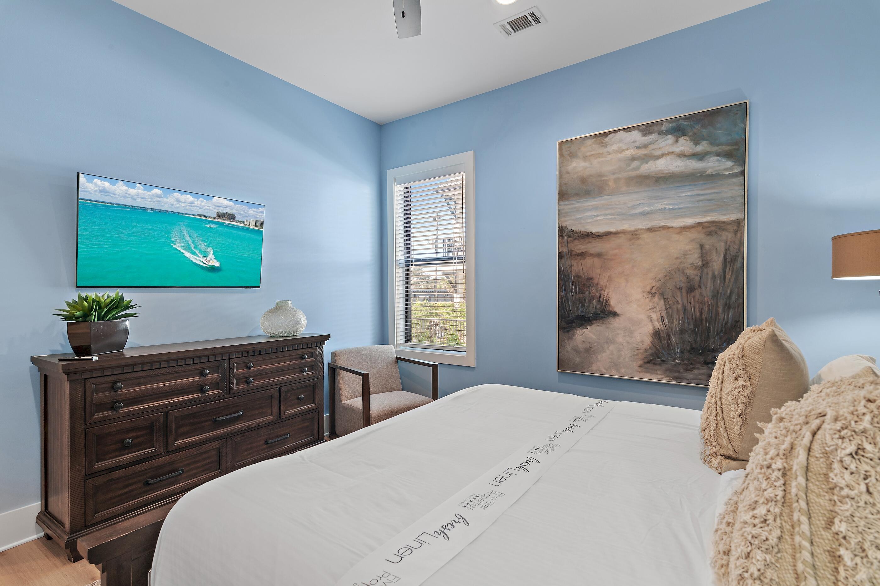 217 Snowdrift Road Miramar Beach, FL 32550 - Photo 59 of 66 a bedroom with a bed and a flat screen tv