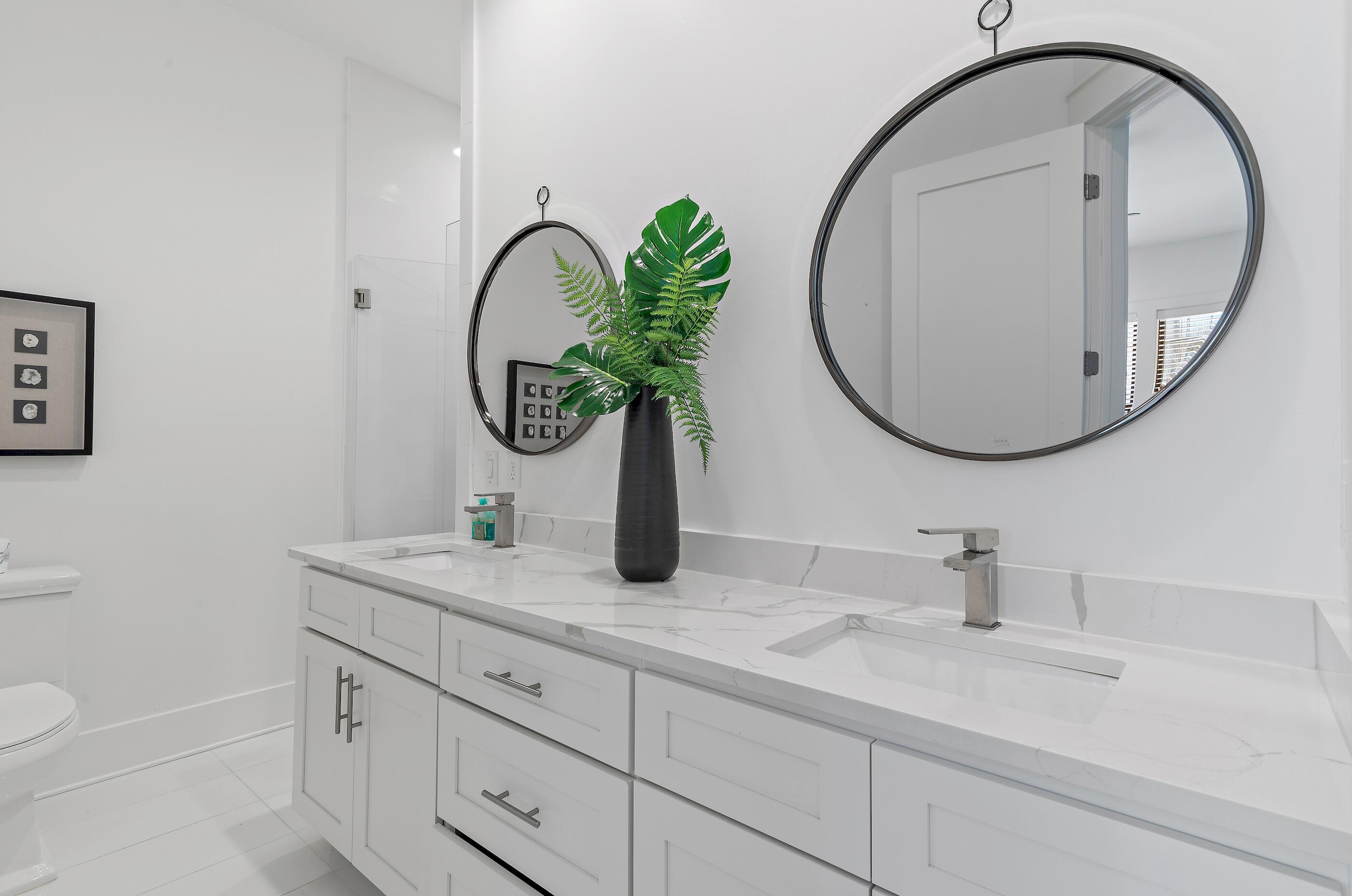217 Snowdrift Road Miramar Beach, FL 32550 - Photo 63 of 66 a bathroom with a sink and a mirror