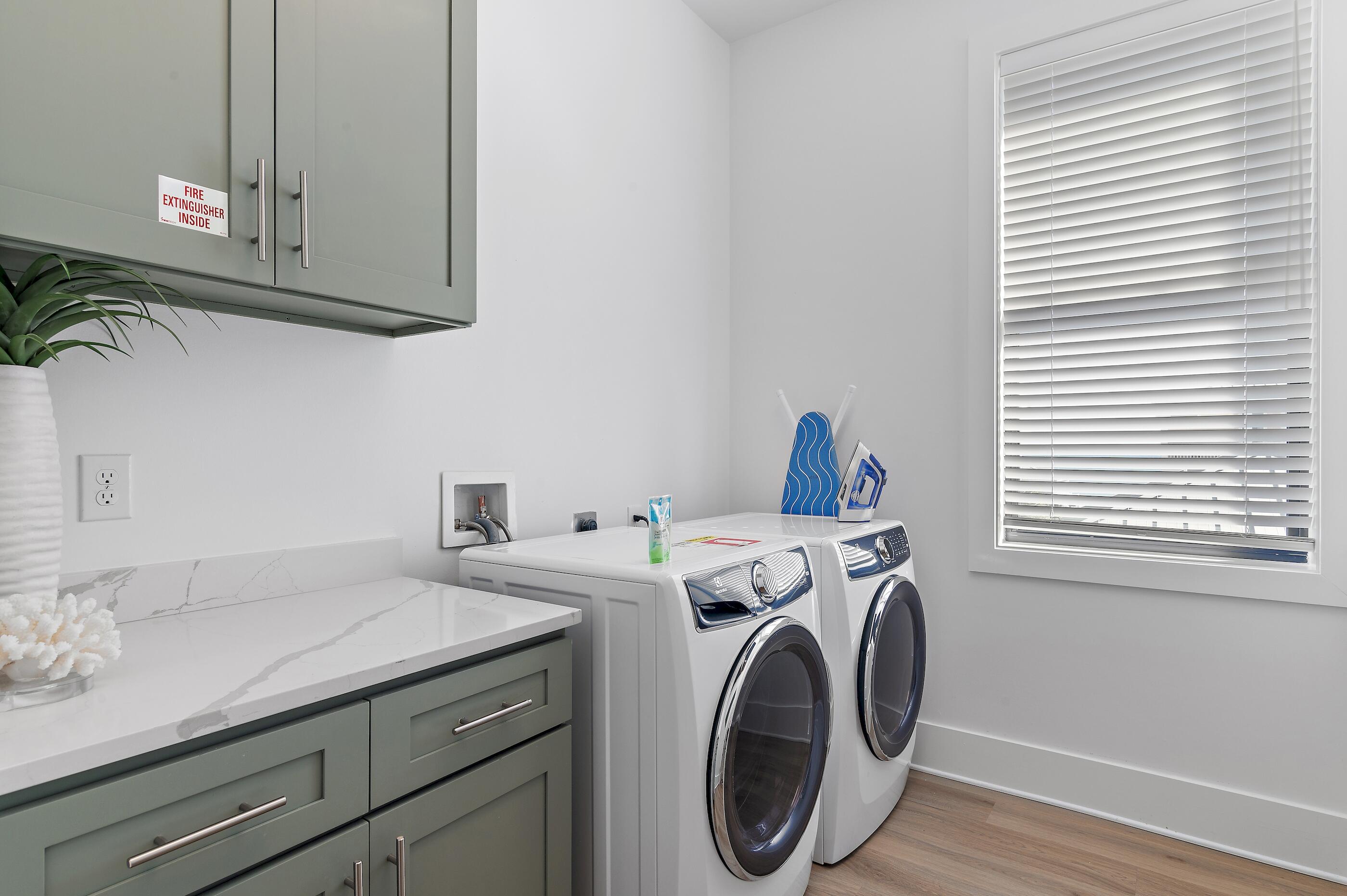 217 Snowdrift Road Miramar Beach, FL 32550 - Photo 66 of 66 a utility room with dryer and washer