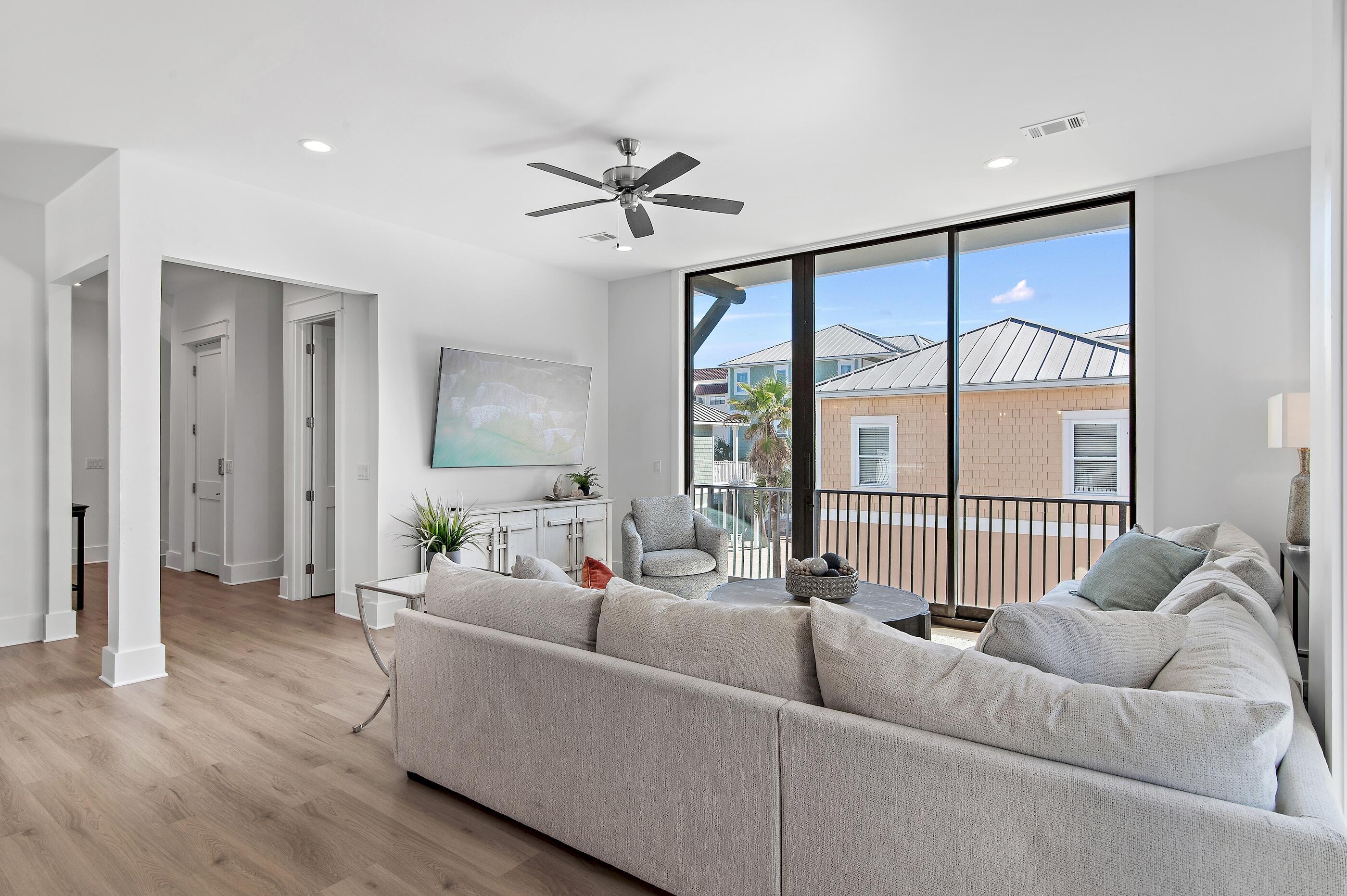 217 Snowdrift Road Miramar Beach, FL 32550 - Photo 10 of 66 a living room with furniture and a large window