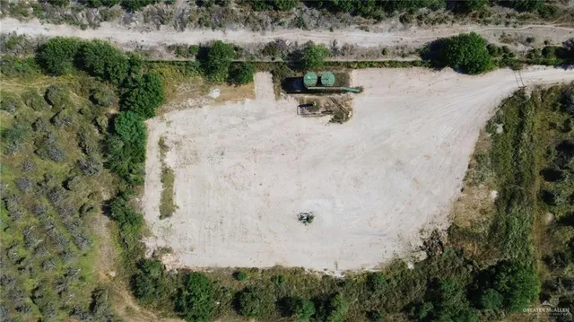 a view of a back yard of a house