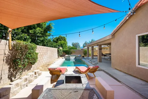 a view of yard with patio