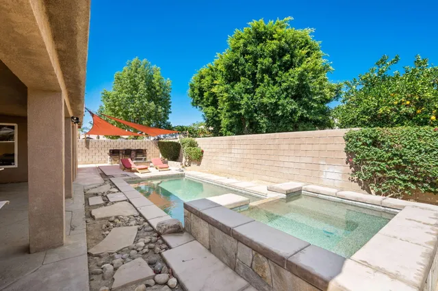 a view of a patio with chair and table