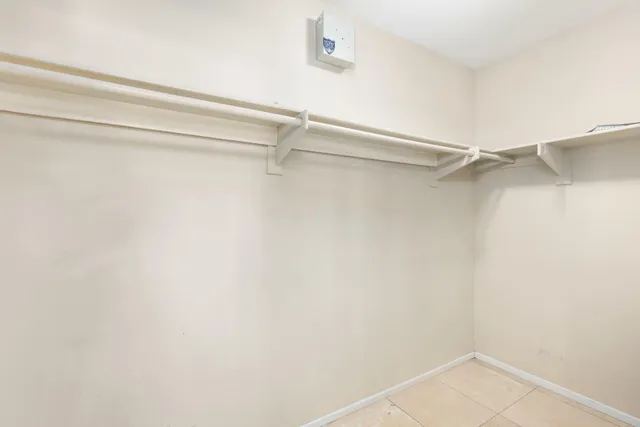 a view of an empty walk in closet