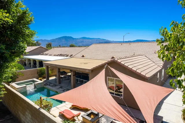 a view of a balcony with chairs
