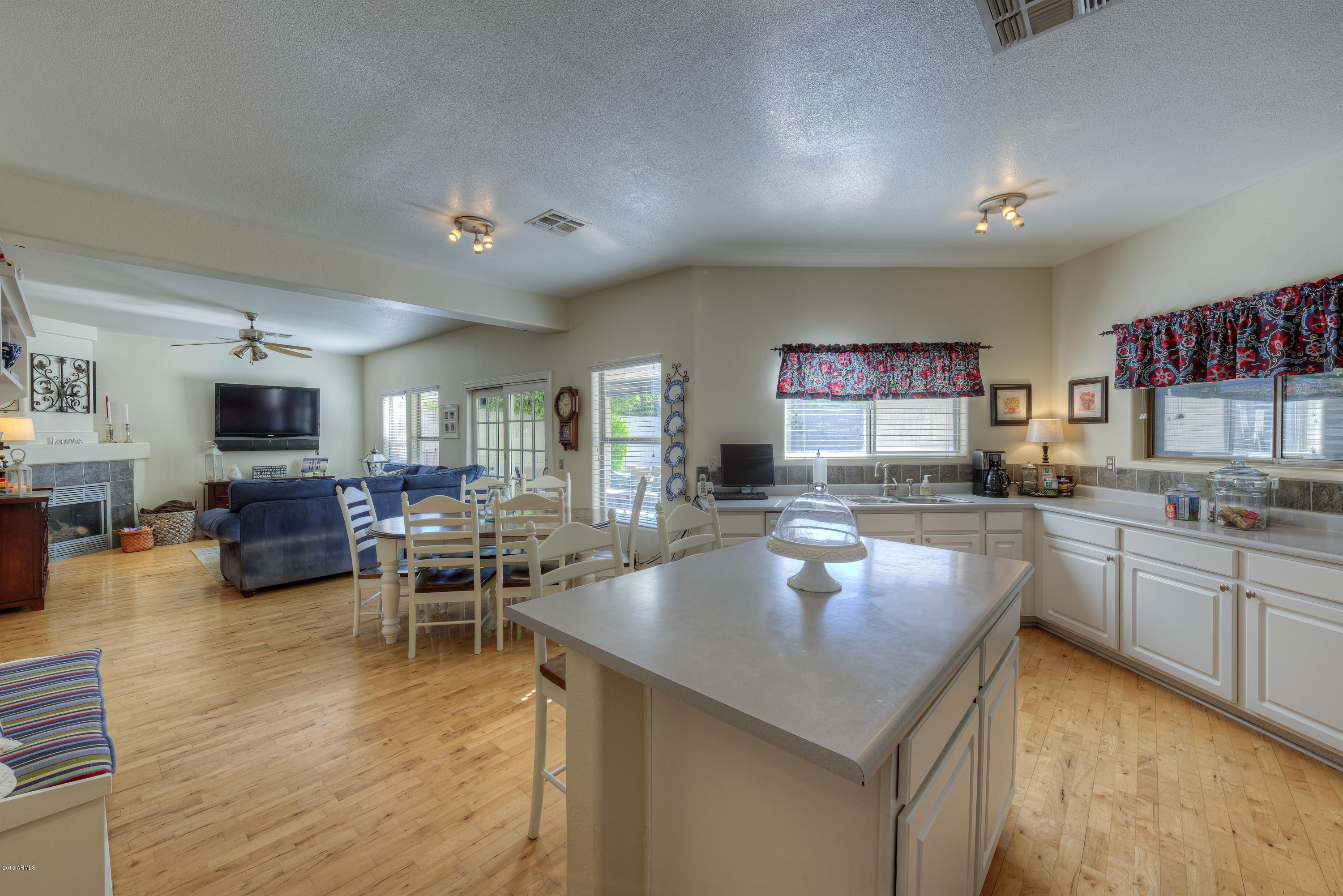 4041 East Tether Trail Phoenix, AZ 85050 - Photo 7 of 22 007_Kitchen and Family Room