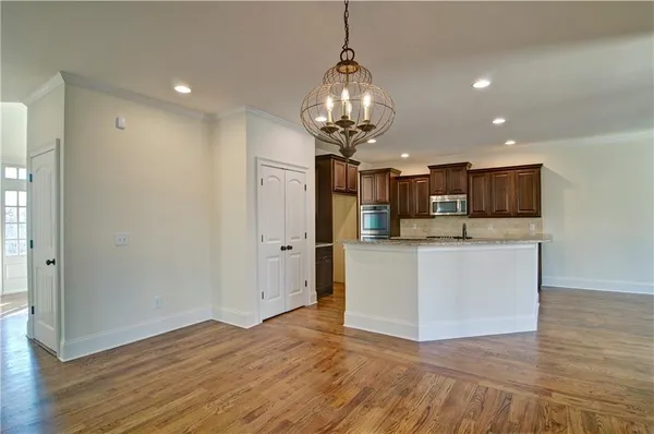 a view of an empty room with a fan