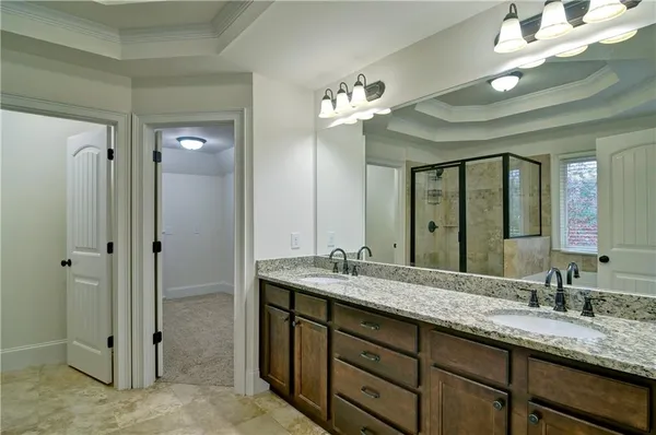 a view of a house with wooden deck