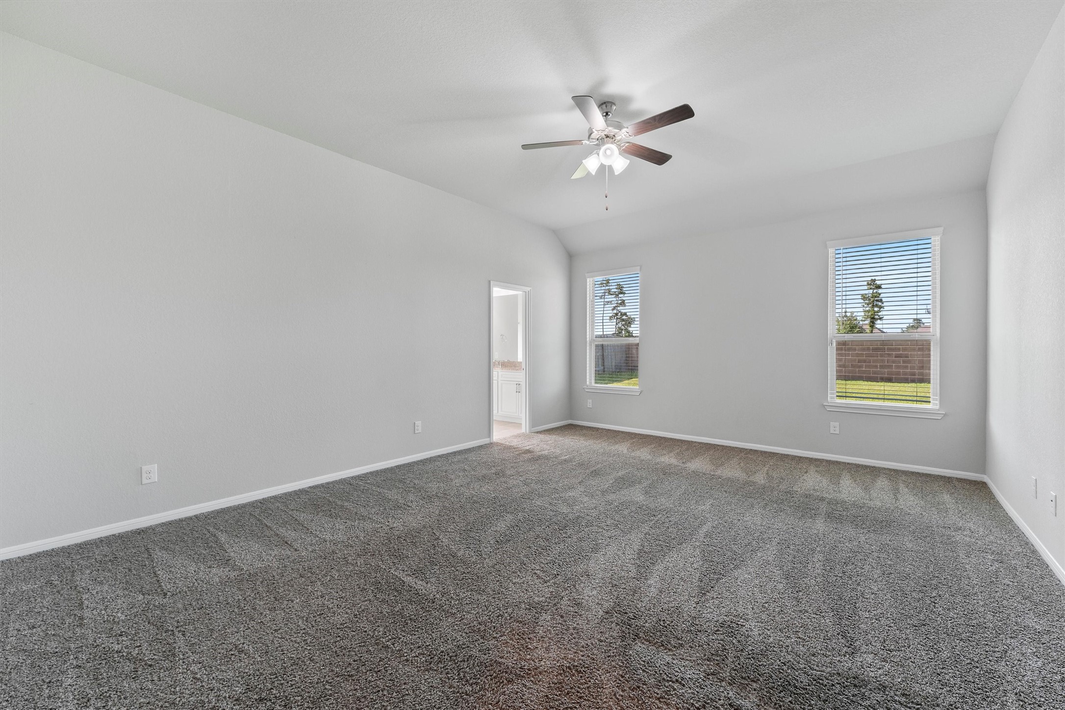 12043 Talmadge Reach Drive Humble, TX 77346 - Photo 15 of 33 a view of an empty room with a window