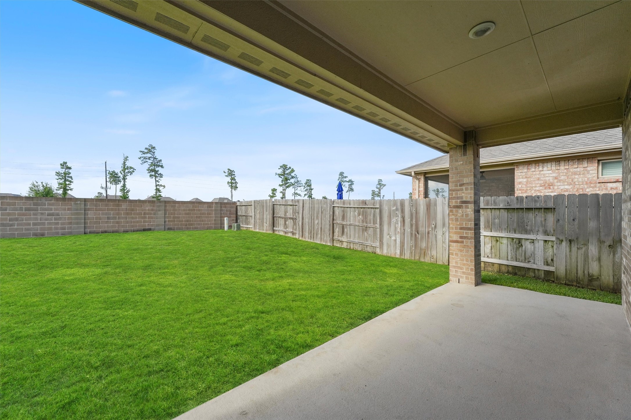 12043 Talmadge Reach Drive Humble, TX 77346 - Photo 23 of 33 a view of a back yard