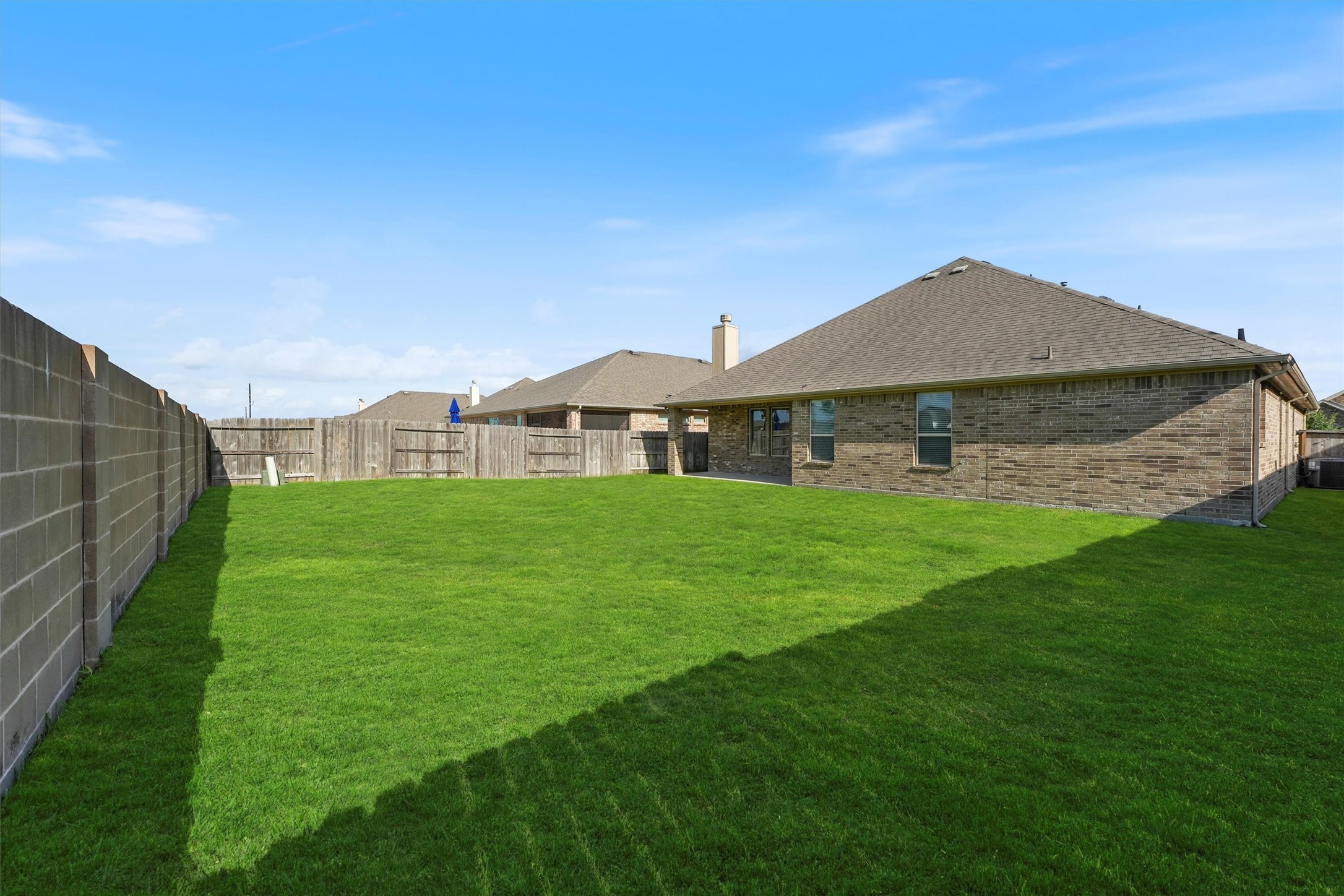 12043 Talmadge Reach Drive Humble, TX 77346 - Photo 25 of 33 a front view of a house with garden
