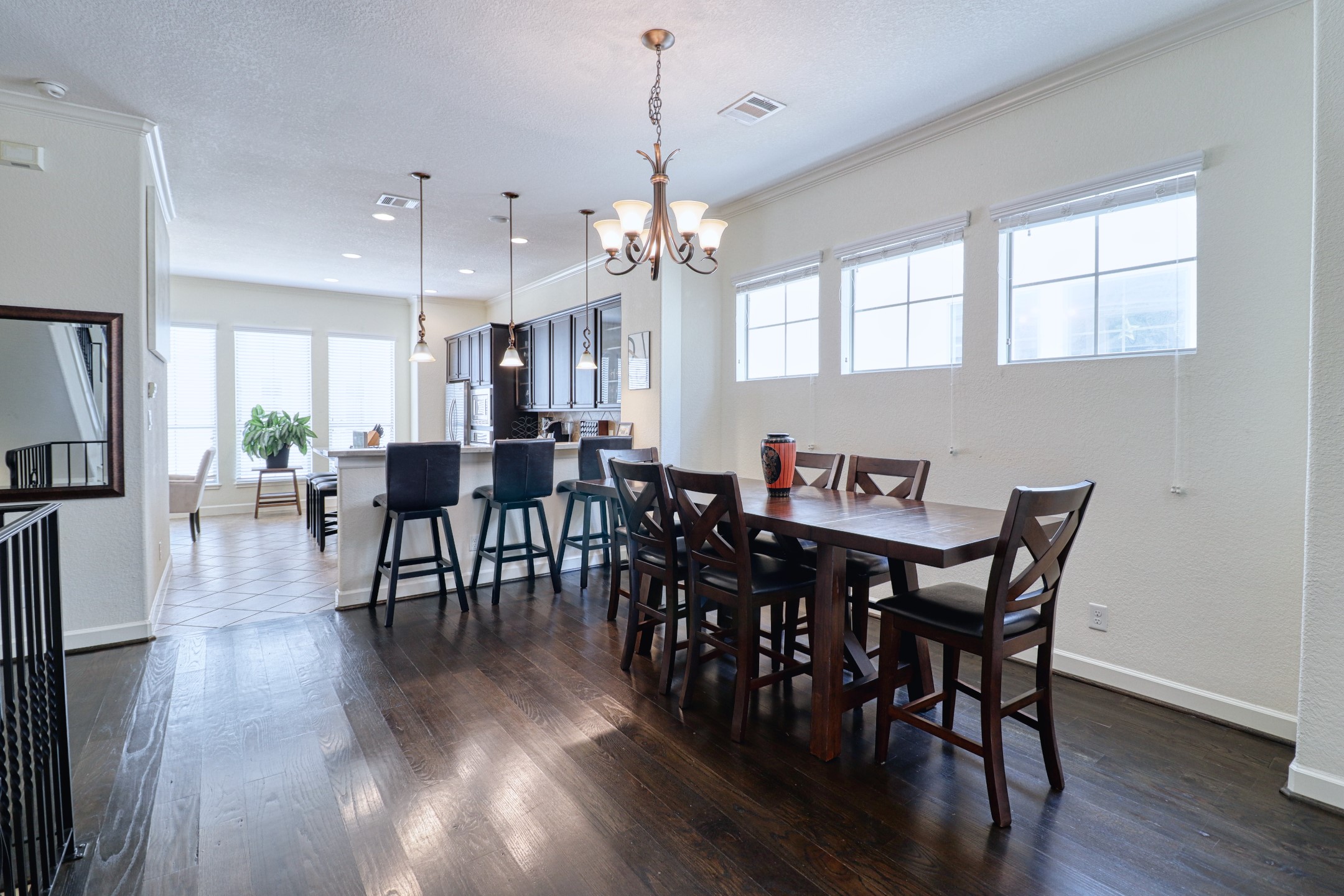 904 Patterson Street Houston, TX 77007 - Photo 13 of 30 a view of a dining room with furniture window and wooden floor
