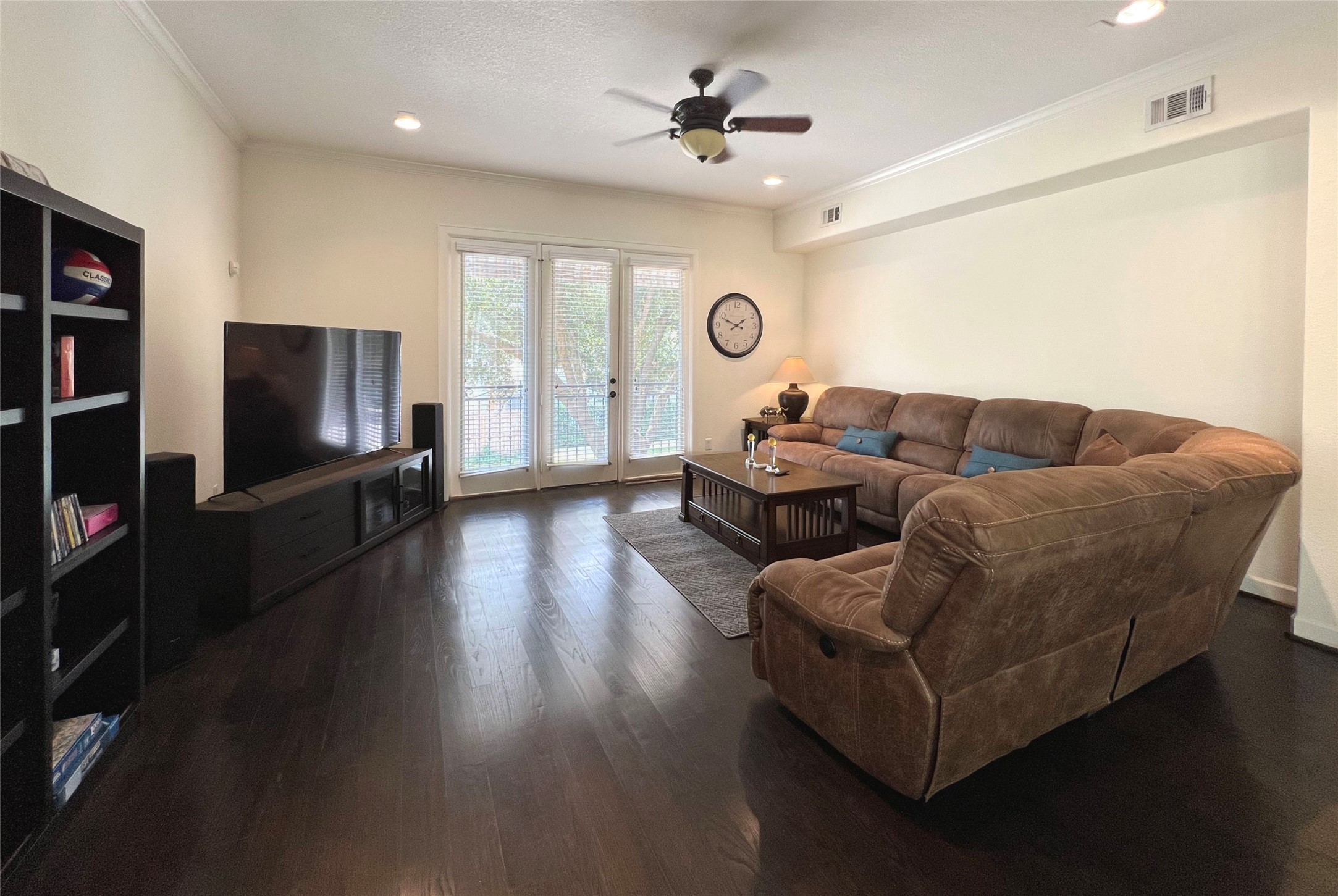 904 Patterson Street Houston, TX 77007 - Photo 10 of 30 a living room with fireplace furniture and a flat screen tv