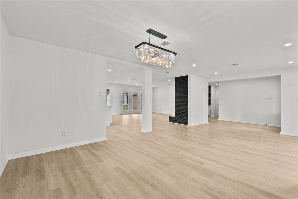 5762 Birdwood Road Houston, TX 77096 - Photo 4 of 50 ENJOY DINNERS IN UNDER LUXURY MODERN LIGHTING, WITH PLENTY OF ROOM.