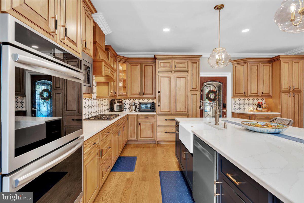 341 Station Avenue Haddonfield, NJ 08033 - Photo 19 of 71 a large kitchen with stainless steel appliances lots of counter space and a sink