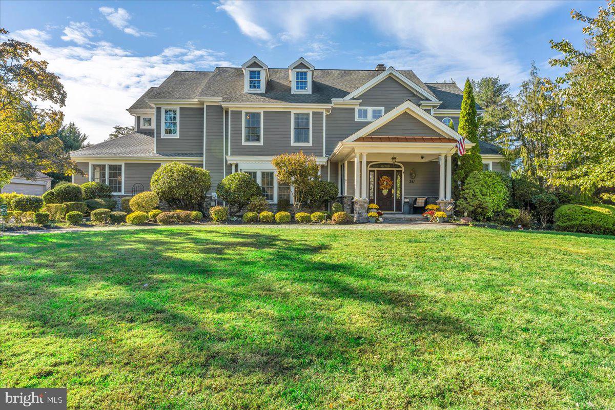 341 Station Avenue Haddonfield, NJ 08033 - Photo 3 of 71 a front view of a house with a yard