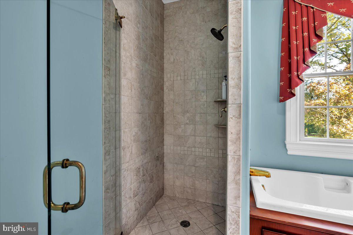 341 Station Avenue Haddonfield, NJ 08033 - Photo 44 of 71 a bathroom with a bath tub and shower