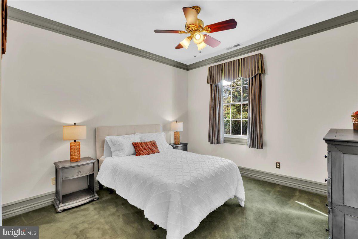 341 Station Avenue Haddonfield, NJ 08033 - Photo 45 of 71 a bedroom with a bed and a window