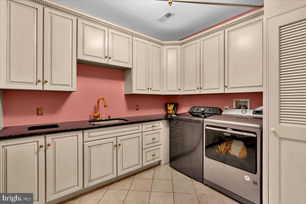 341 Station Avenue Haddonfield, NJ 08033 - Photo 47 of 71 a kitchen with stainless steel appliances granite countertop a sink and cabinets