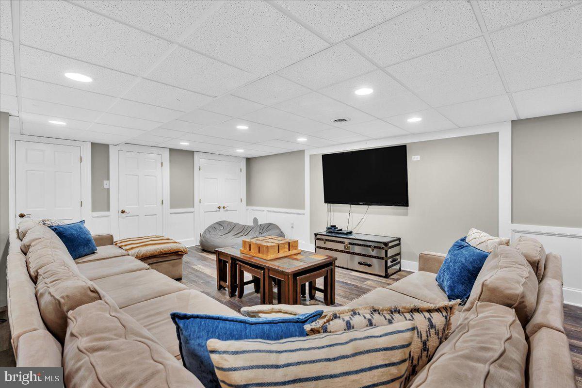 341 Station Avenue Haddonfield, NJ 08033 - Photo 49 of 71 a living room with furniture and a flat screen tv
