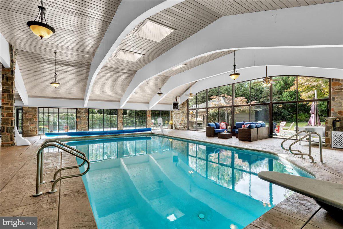 341 Station Avenue Haddonfield, NJ 08033 - Photo 55 of 71 a view of a swimming pool with seating space