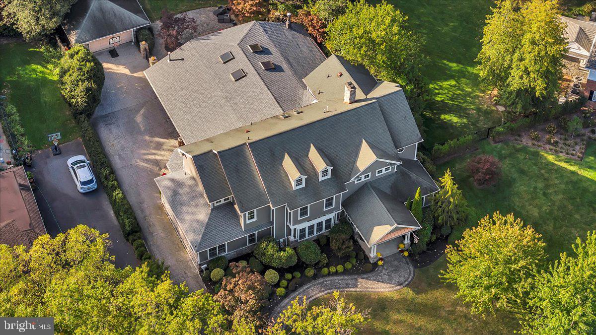 341 Station Avenue Haddonfield, NJ 08033 - Photo 66 of 71 an aerial view of a house with a yard and large trees