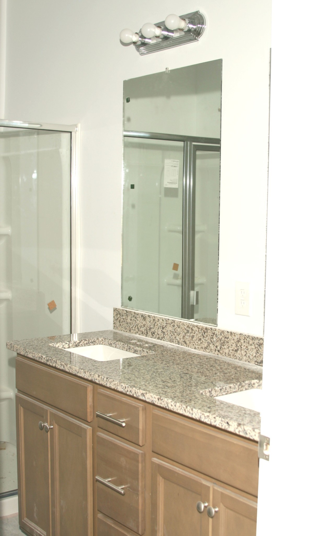 1218 Euclid Murfreesboro, TN 37127 - Photo 4 of 9 a bathroom with a granite countertop sink and a mirror