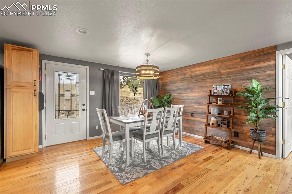 608 Slater Creek Road Guffey, CO 80820 - Photo 14 of 47 a dining room with furniture and window