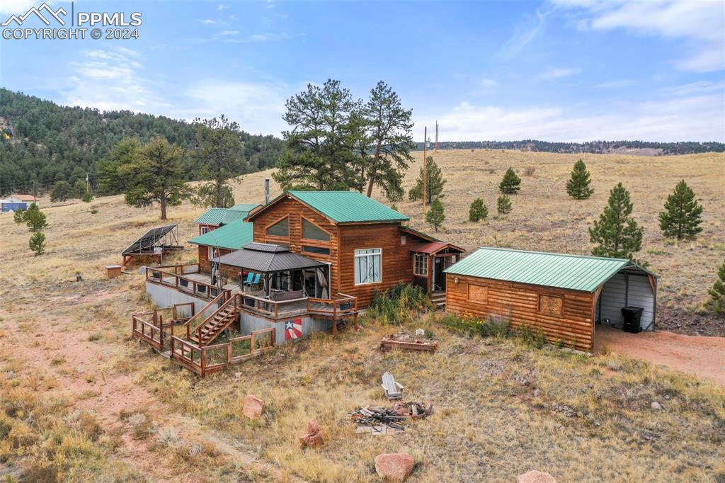 608 Slater Creek Road Guffey, CO 80820 - Photo 2 of 47 an aerial view of a house with a ocean view