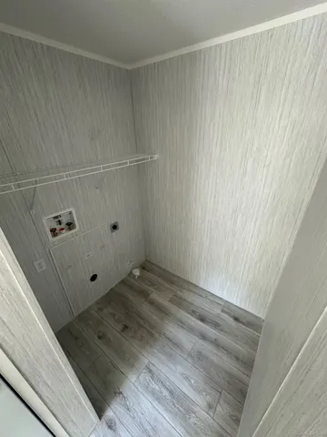 a view of a utility room with fan