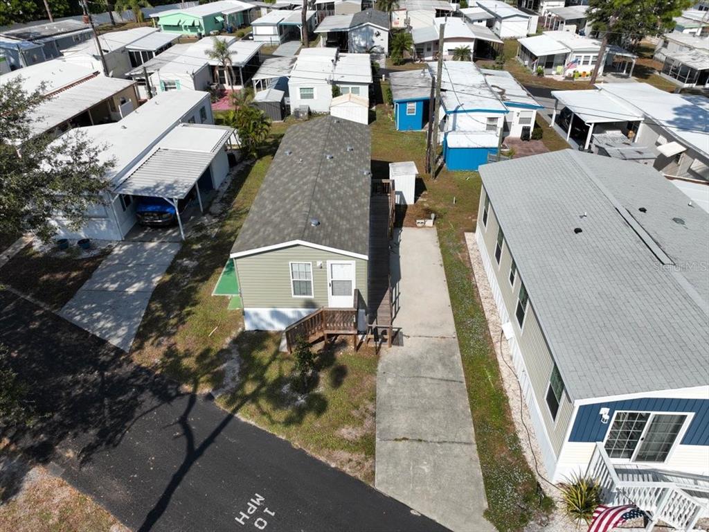 1800 Englewood Road, Unit 166 Englewood, FL 34223 - Photo 28 of 34 an aerial view of a house with a yard