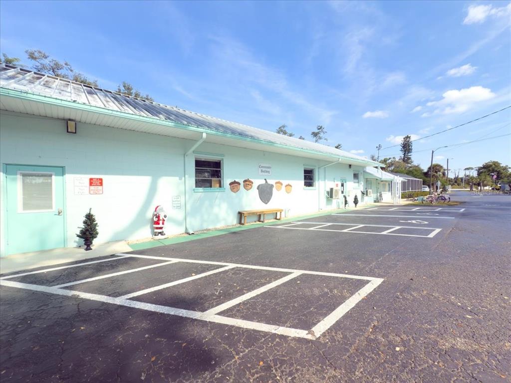 1800 Englewood Road, Unit 166 Englewood, FL 34223 - Photo 33 of 34 a view of a basket ball ground and a garage
