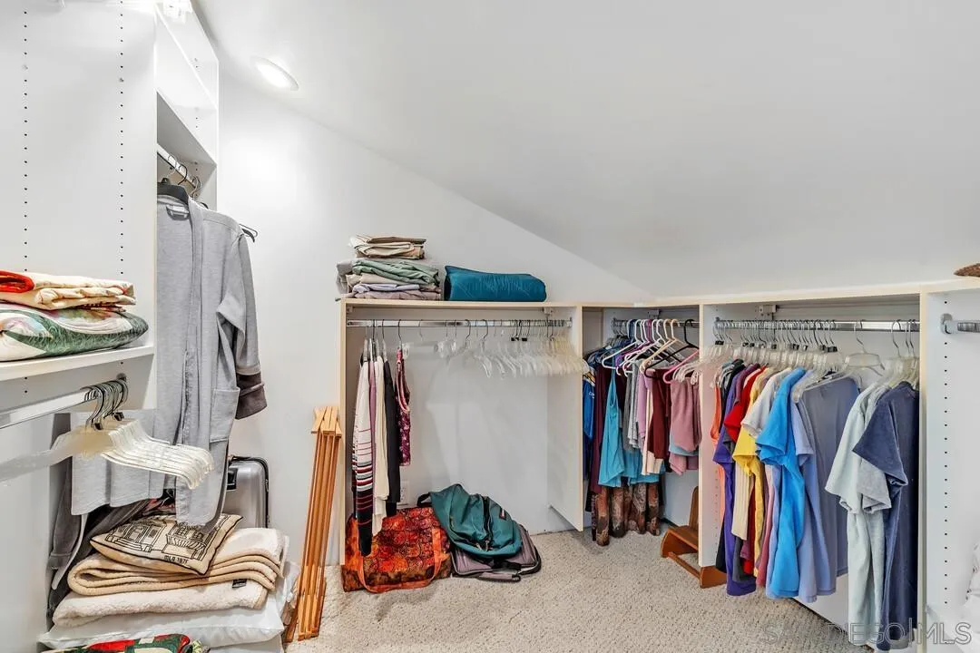 8320 Oconnell Road El Cajon, CA 92021 - Photo 19 of 62 a view of walk in closet with clothes