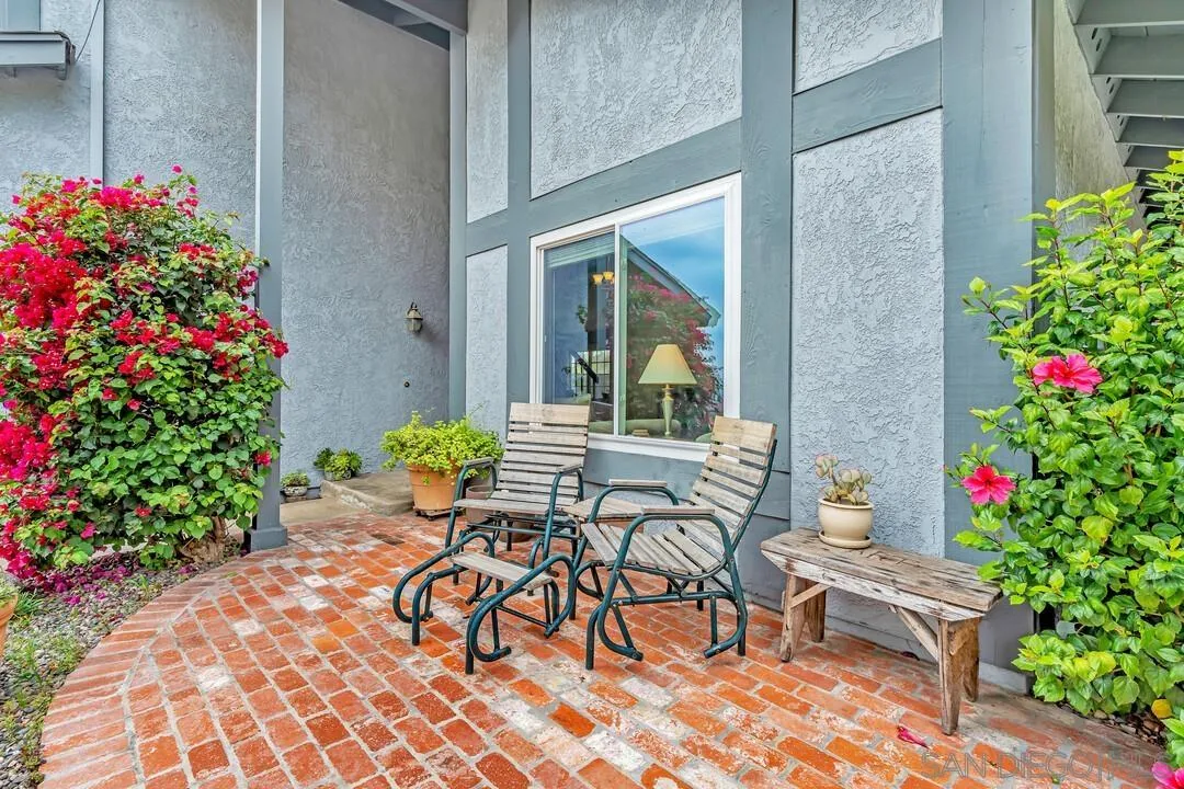 8320 Oconnell Road El Cajon, CA 92021 - Photo 2 of 62 a view of a patio with table and chairs and potted plants