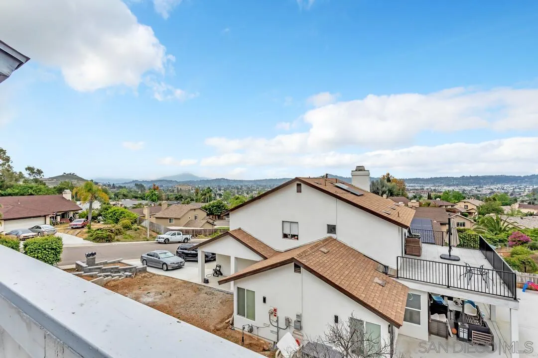 8320 Oconnell Road El Cajon, CA 92021 - Photo 26 of 62 a view of a white house next to a road
