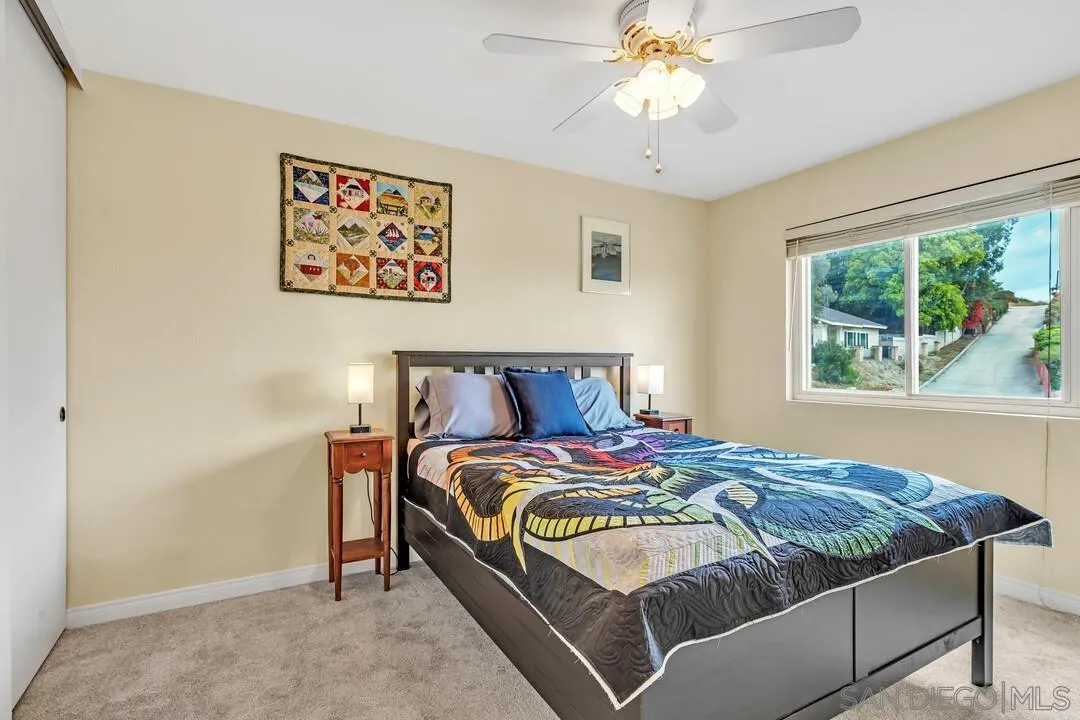 8320 Oconnell Road El Cajon, CA 92021 - Photo 29 of 62 a bedroom with bed and a window