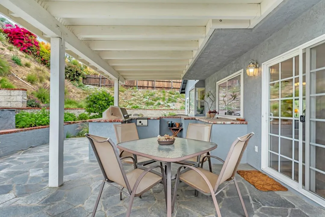 8320 Oconnell Road El Cajon, CA 92021 - Photo 34 of 62 a view of a dining room with furniture window and outside view