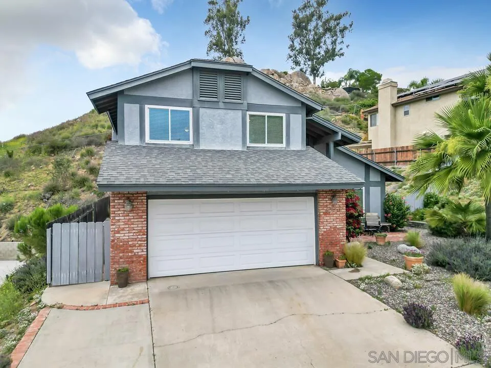 8320 Oconnell Road El Cajon, CA 92021 - Photo 45 of 62 a front view of a house with garage