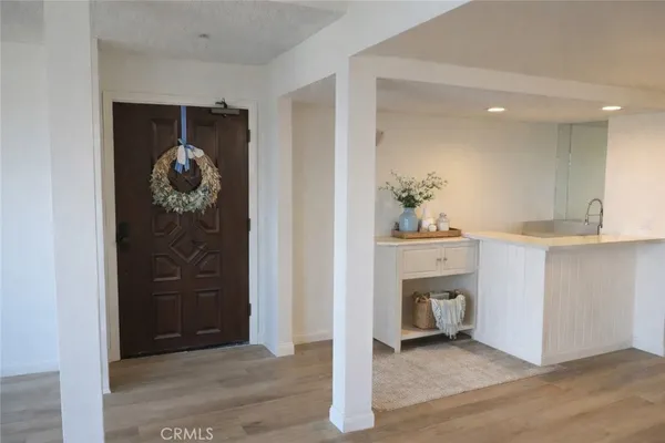 a view of livingroom with furniture and a fireplace