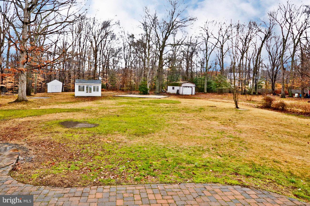 14302 Duckett Road Brandywine, MD 20613 - Photo 25 of 25 Exterior (Rear) play house and shed